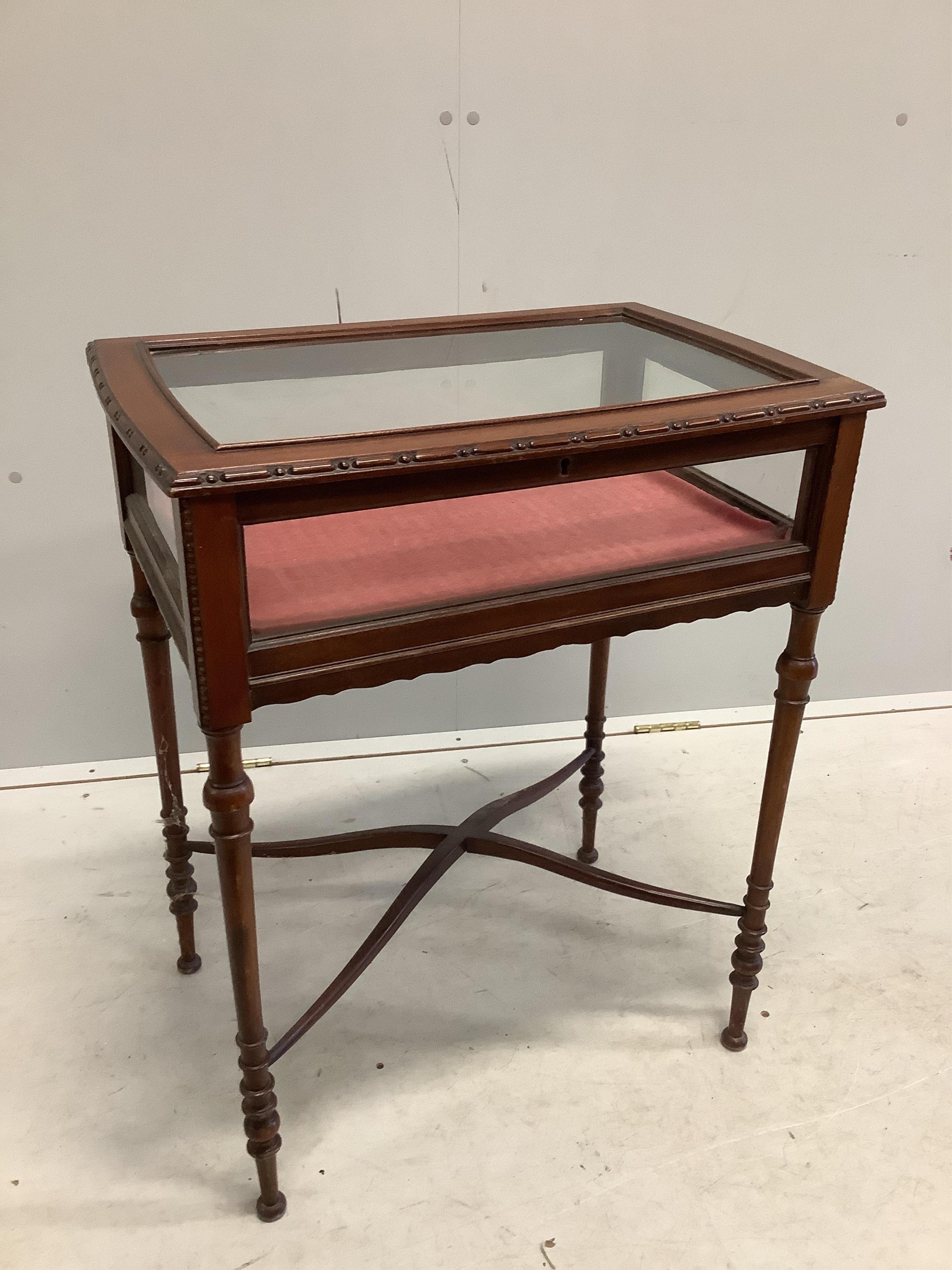 An early 20th century mahogany bijouterie table, width 60cm, depth 42cm, height 73cm. Condition - fair